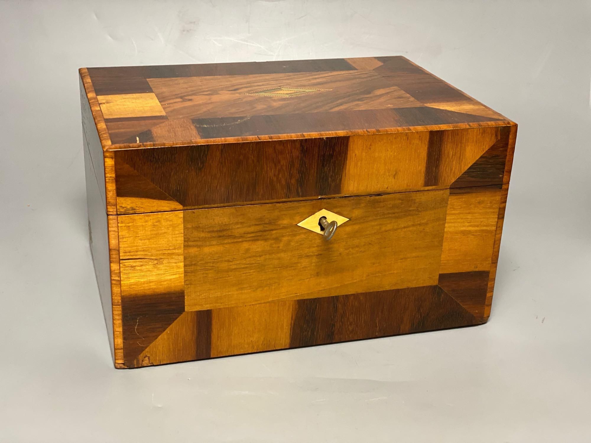 A Victorian crossbanded parquetry work box, 28cm and a rosewood writing slope